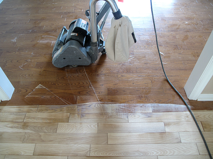 How I Refinished Our Hardwood Floors: http://sharktails.ca/2016/07/10/refinish-hardwood-floors/
