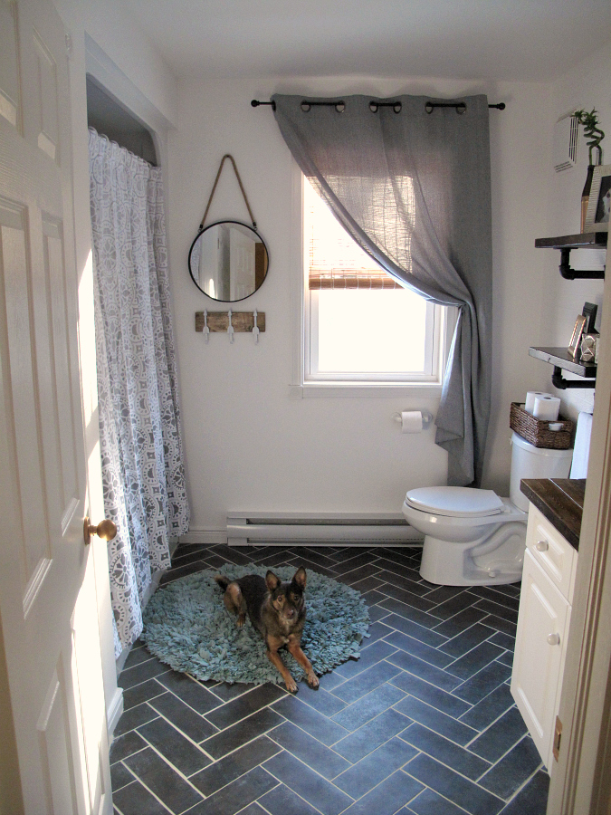 DIY Herringbone Floor Using Peel n' Stick Luxury Vinyl Tile! http://sharktails.ca/2016/01/10/herringbone-floor/