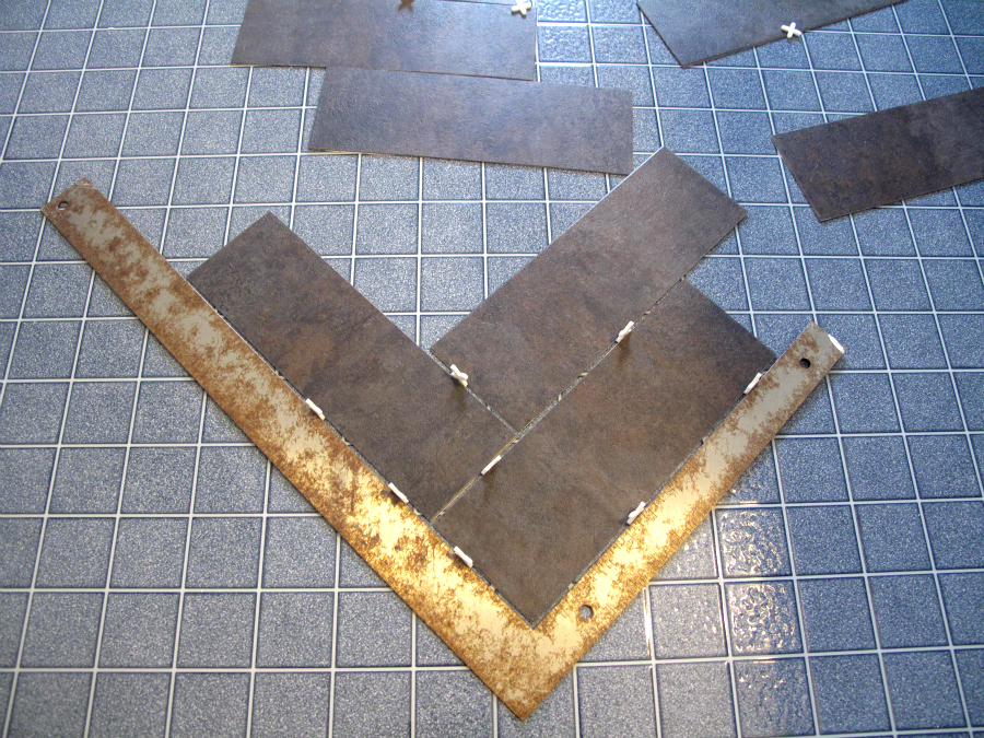 DIY Herringbone Floor Using Peel n' Stick Luxury Vinyl Tile! http://sharktails.ca/2016/01/10/herringbone-floor/