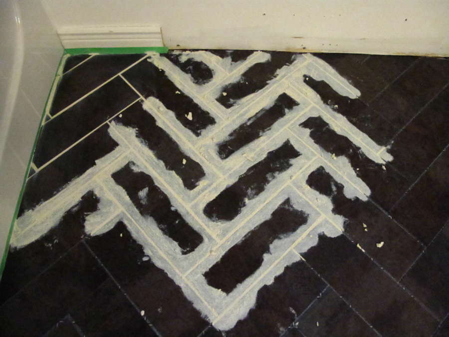 DIY Herringbone Floor Using Peel n' Stick Luxury Vinyl Tile! http://sharktails.ca/2016/01/10/herringbone-floor/